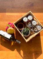 Load image into Gallery viewer, Handcrafted Water Hyacinth Bottle Caddy With Cane Frame

